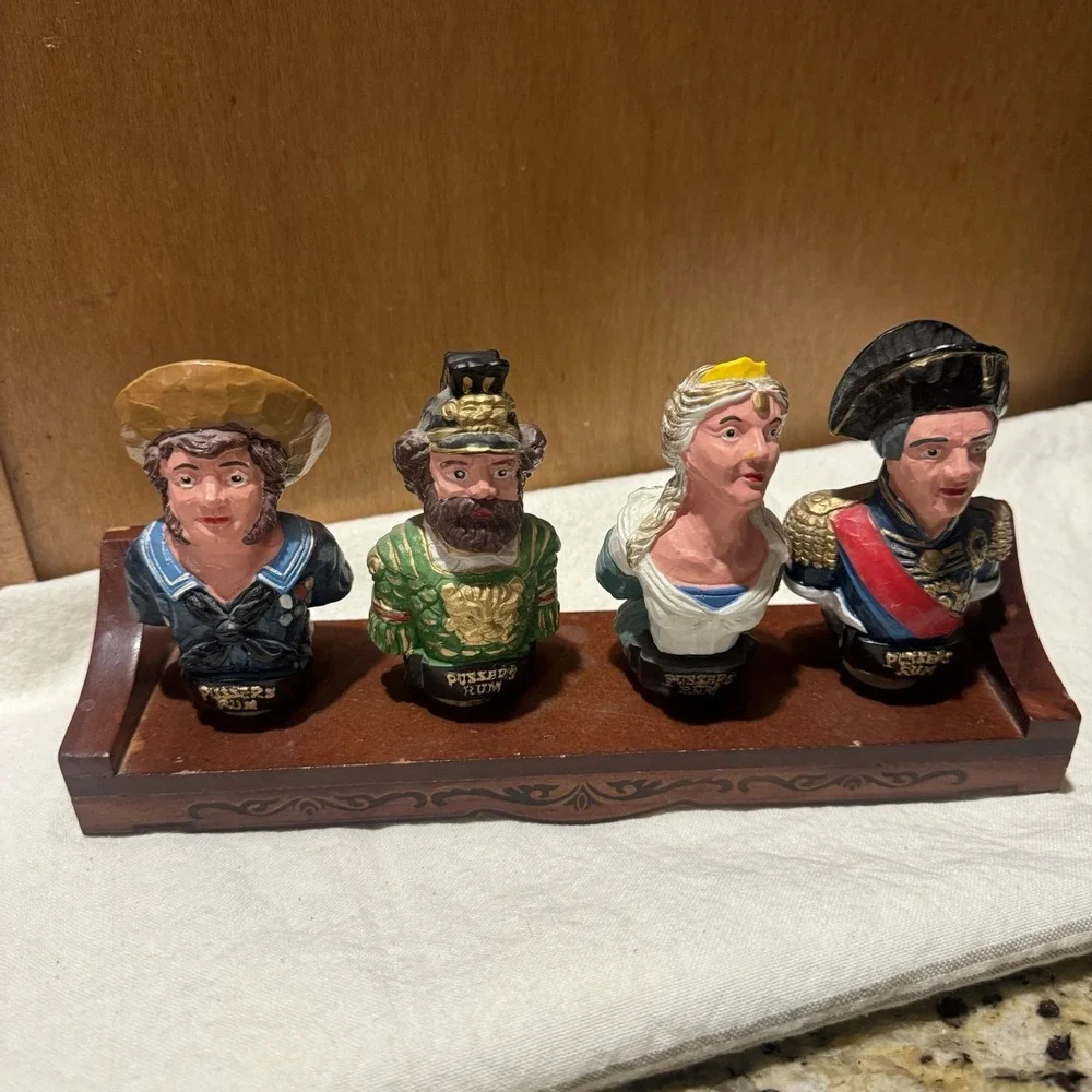 Pusser's Rum Bottle Stoppers Set 4‎ Multi Nautical Busts with Wood Display Rack